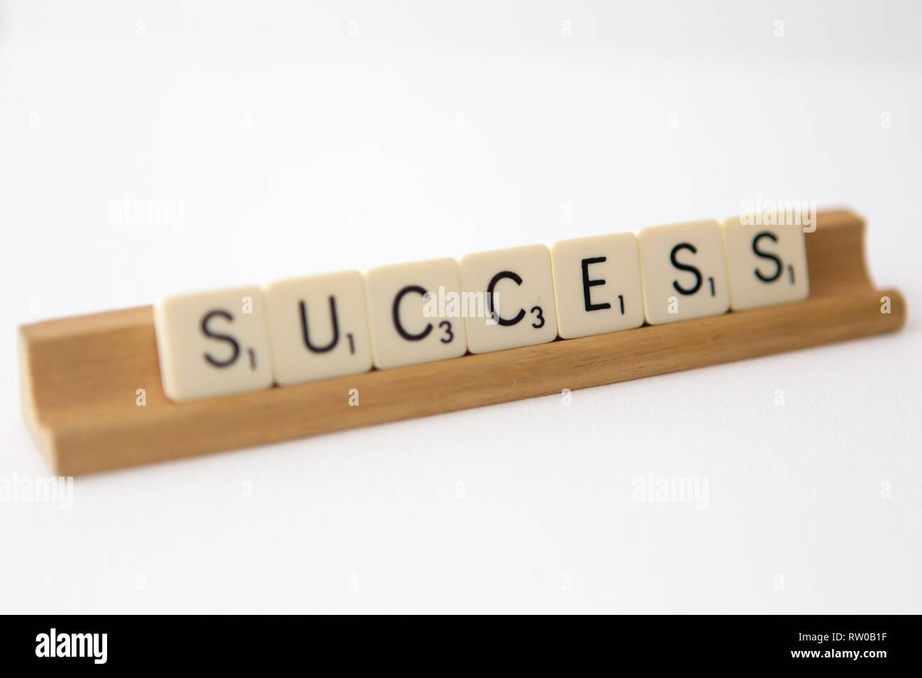 Tiles spell out the word 'success' Stock Photo