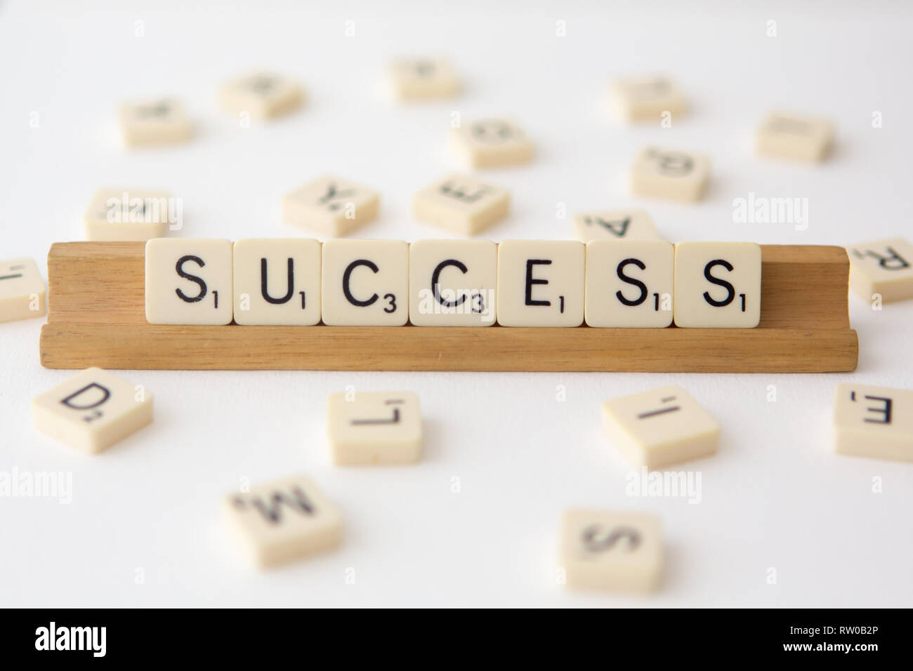 Tiles spell out the word 'success' Stock Photo