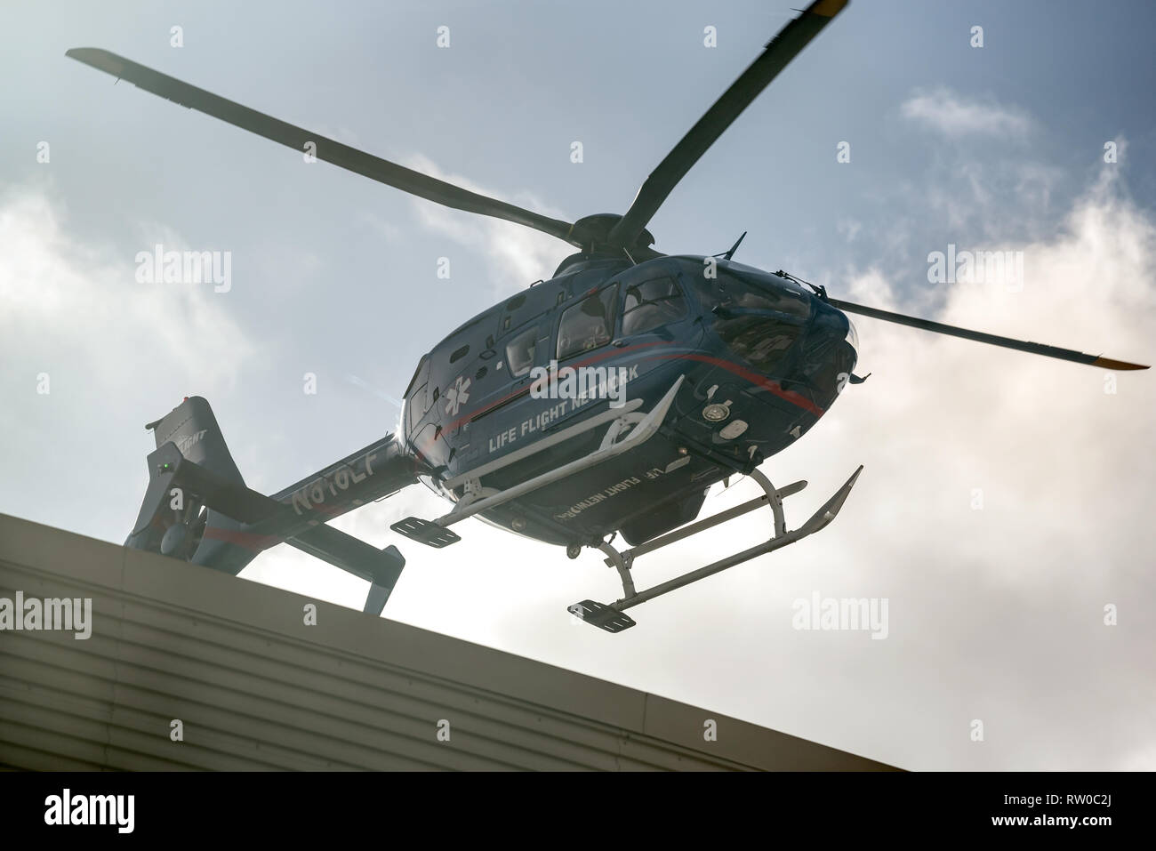 Medical helicopter landing on the roof of Oregon Health Sciences University hospital, Portland
