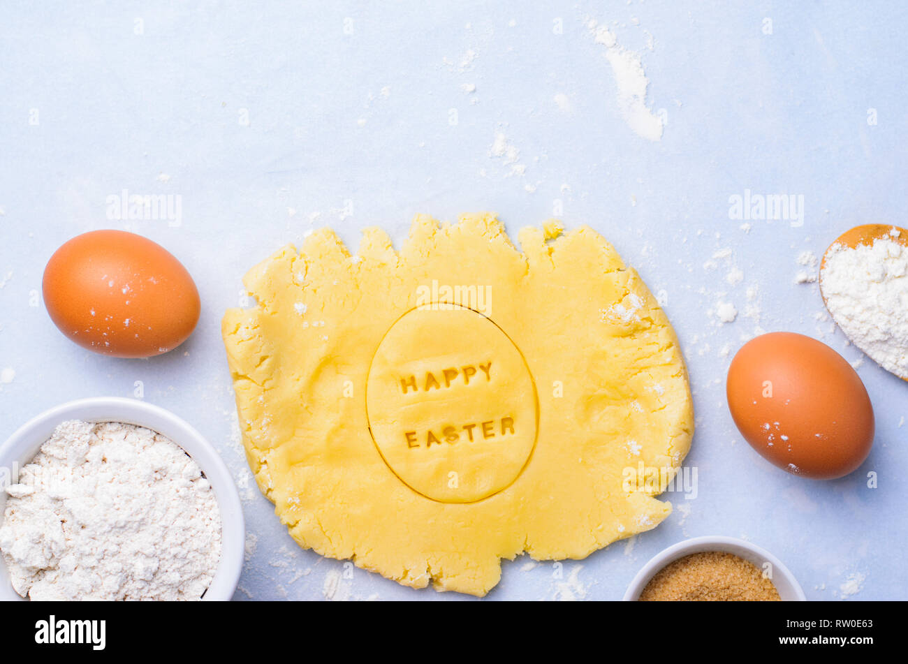 Easter Baking Background, Dough with Happy Easter Lettering, Festive Concept Stock Photo