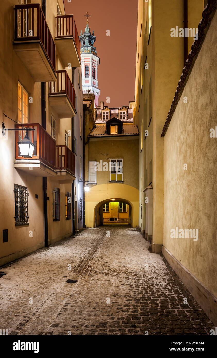 Street on winter night in Old Town of Warsaw city in Poland Stock Photo