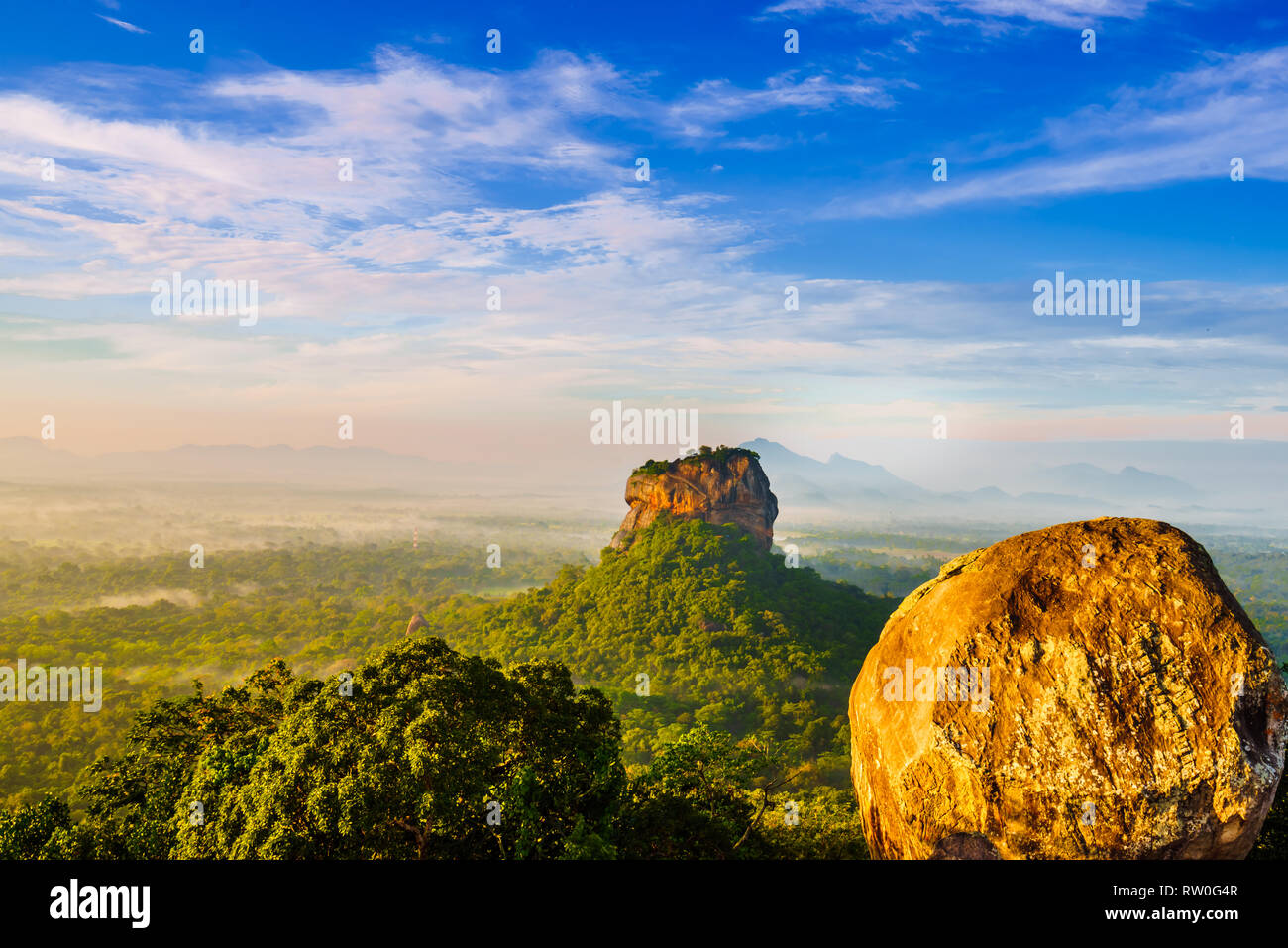 Sunrise view to Sigiriya rock - Lion Rock - from Pidurangala Rock in Sri Lanka Stock Photo