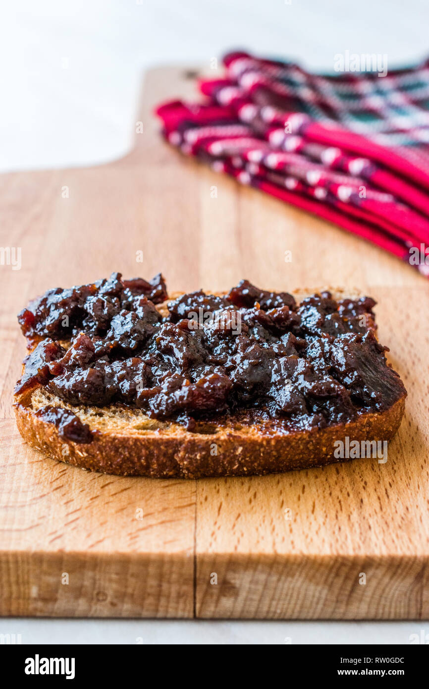 Organic Apple Molasses / Raw Fruit Paste Jam with Bread. Healthy Food Stock Photo Alamy