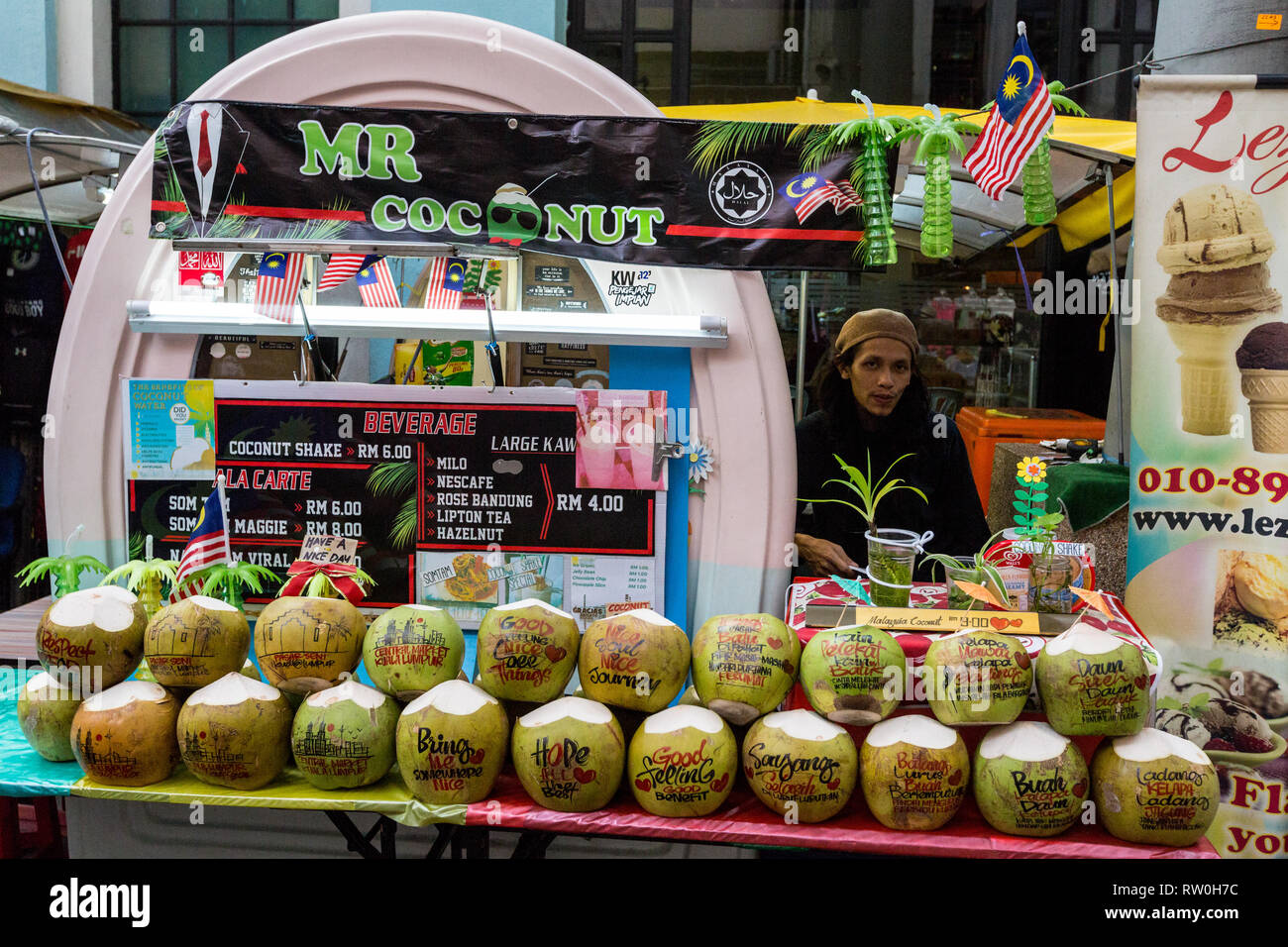 Coconut vendor hi-res stock photography and images - Alamy