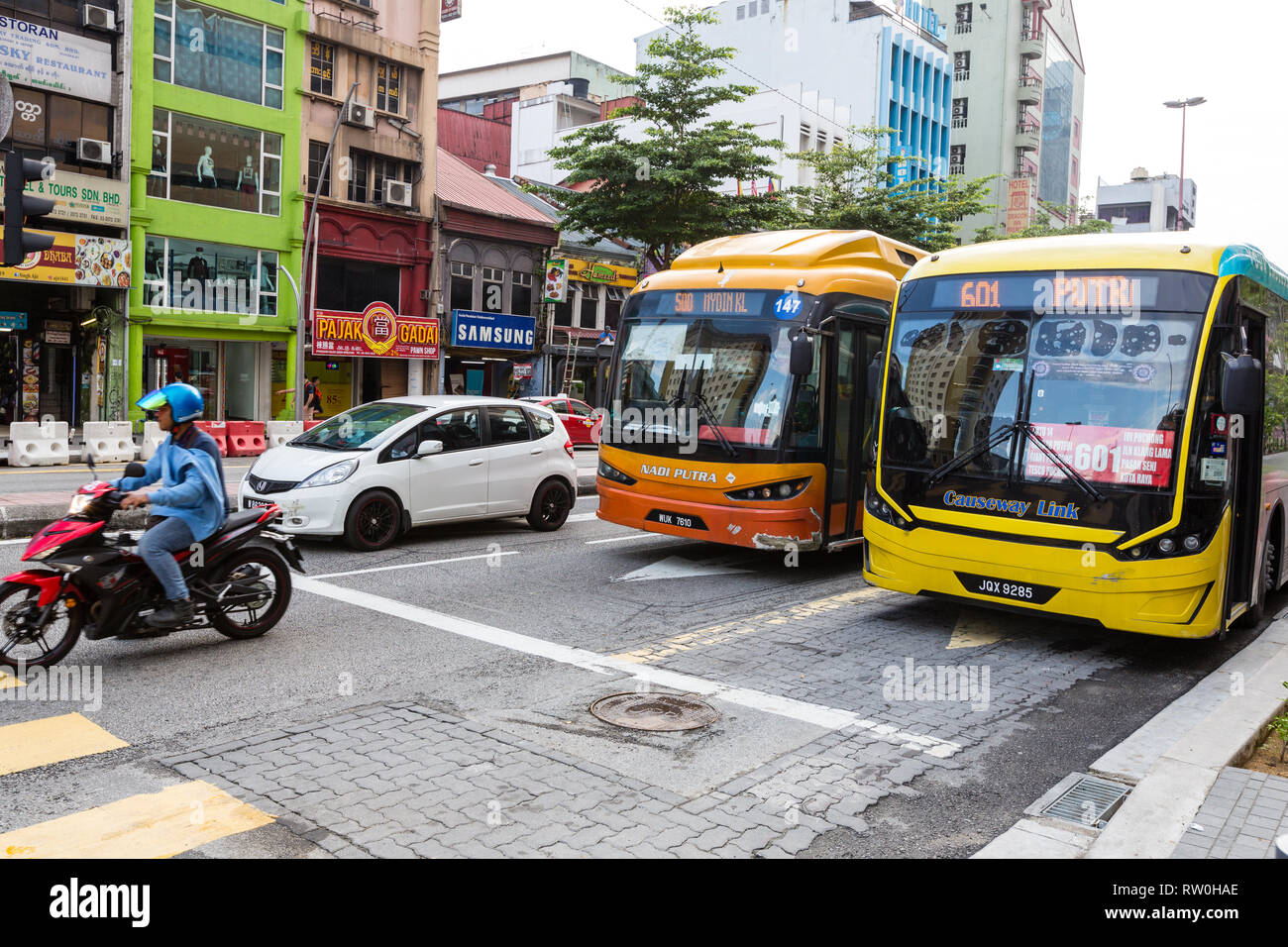 Municipal City Buses, Jalan Tun Tan Cheng Lock Street, Chinatown, Kuala Lumpur, Malaysia. Stock Photo