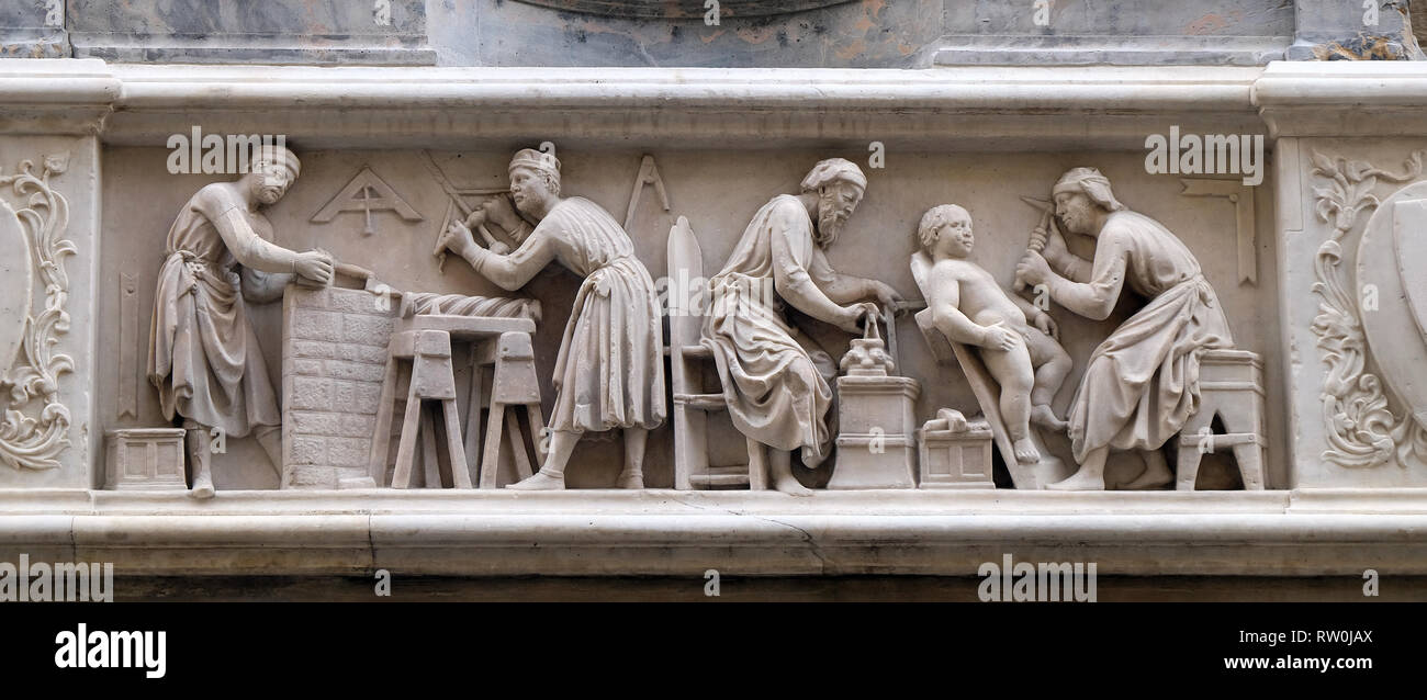 Detail of the sculptors and architects at work, bas-relief by Nanni di Banco, in Orsanmichele Church in Florence, Tuscany, Italy Stock Photo