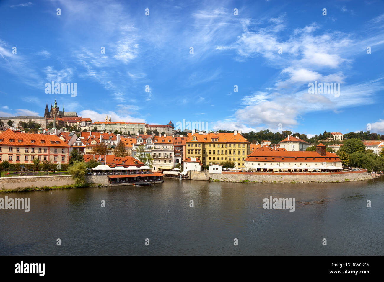 Old town of Prague over river Vltava with Saint Vitus cathedral on skyline. Stock Photo