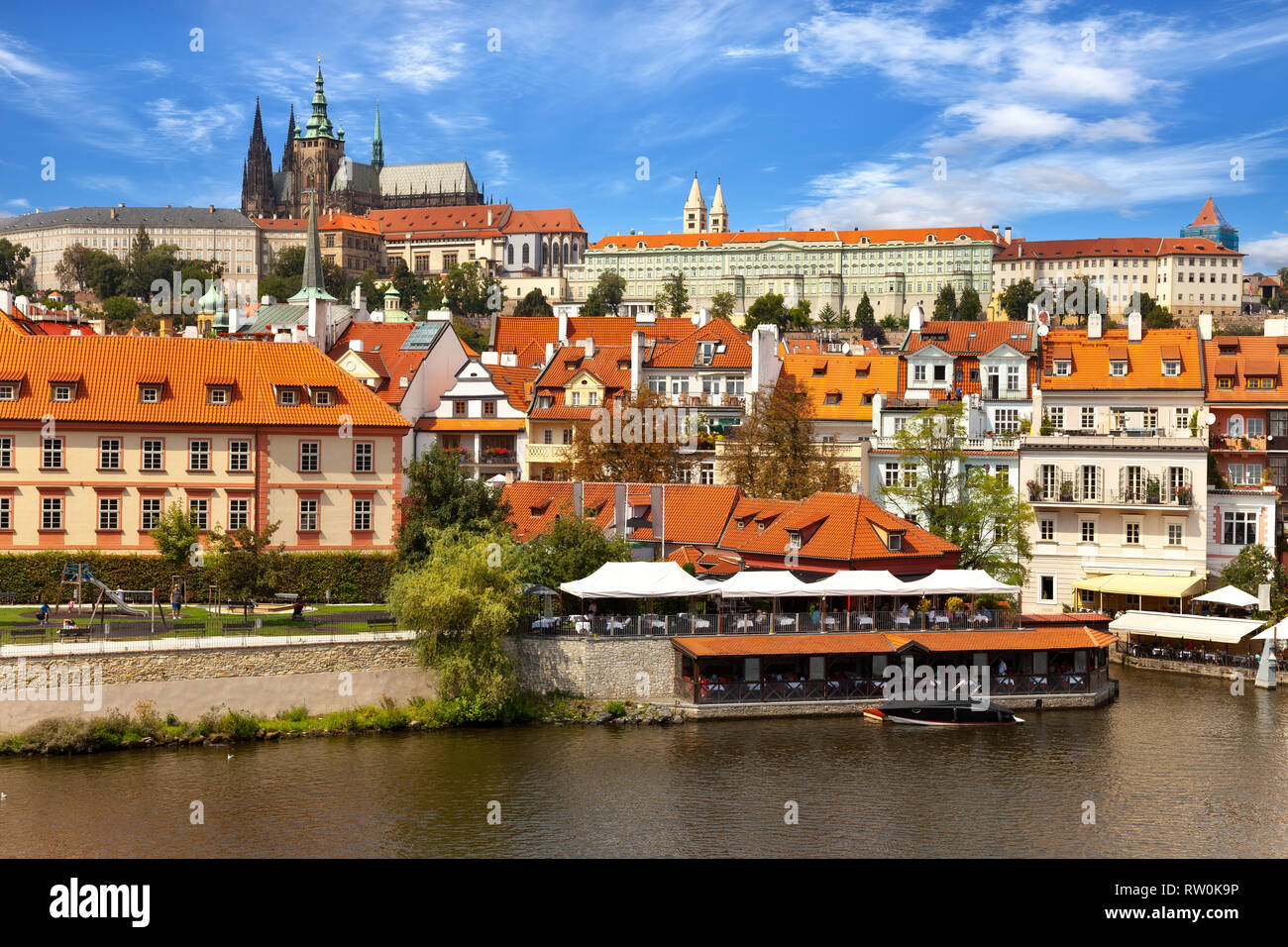 Old town of Prague over river Vltava with Saint Vitus cathedral on skyline. Stock Photo