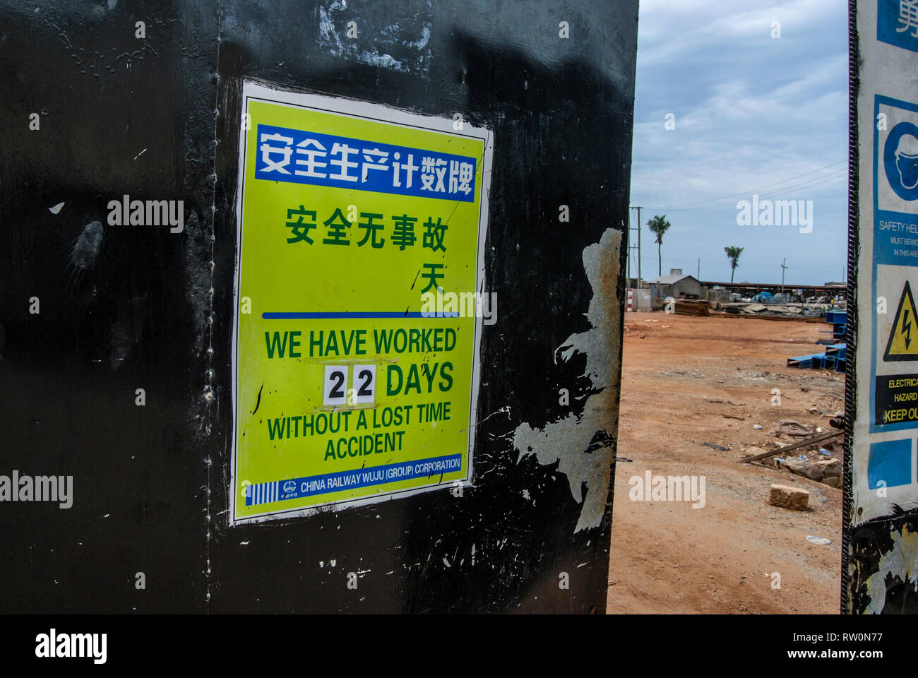 A photo of a gateway to China railway construction site in Elmina, Ghana, West Africa Stock Photo
