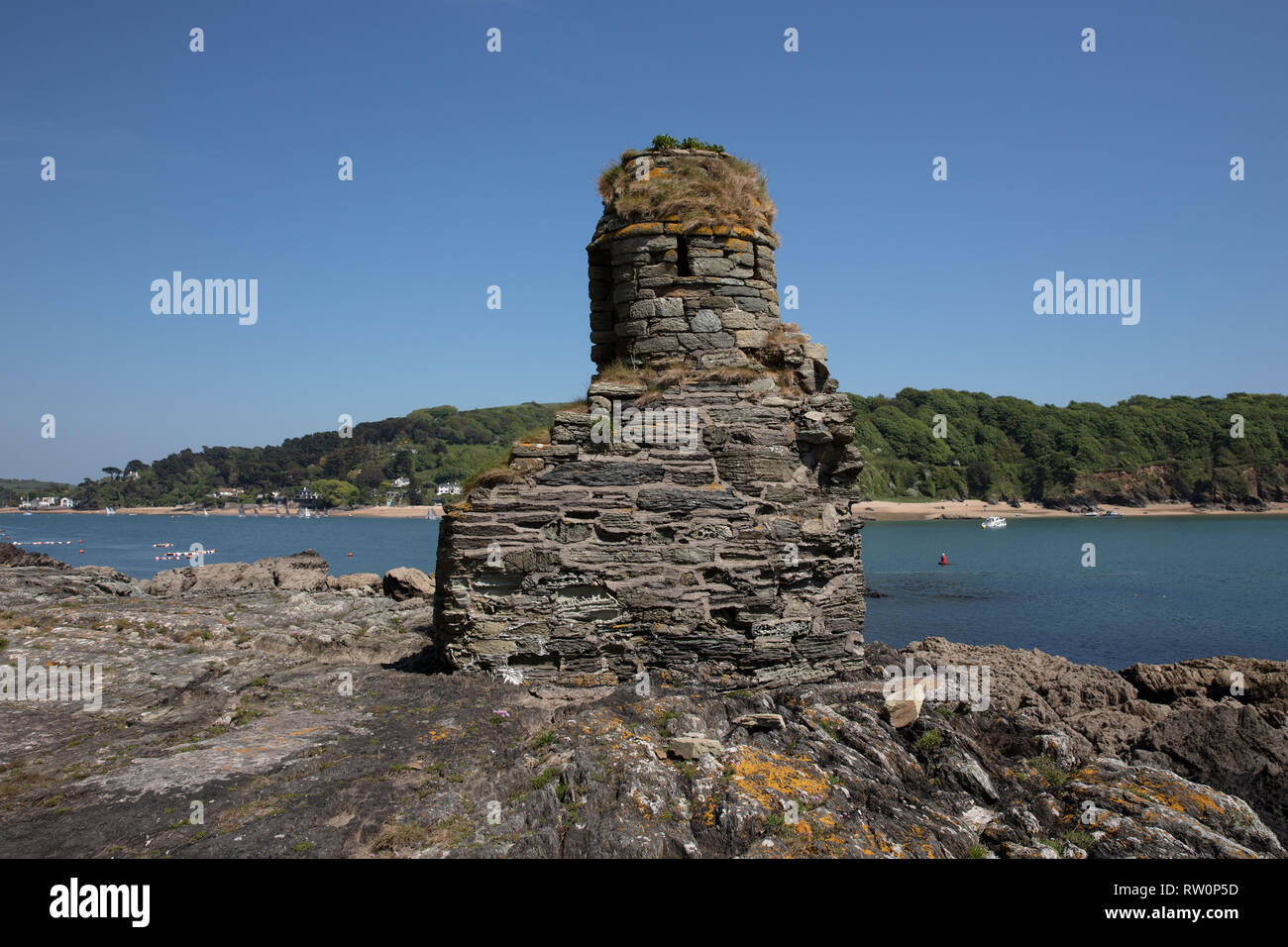 Salcombe Castle or Fort Charles is a ruined fortification just off the beach of North Sands in Salcombe, Devon, England. Stock Photo