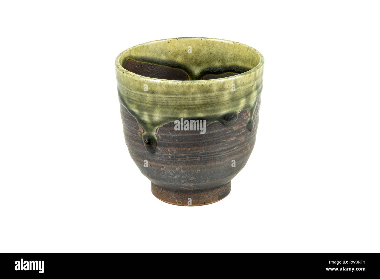 A handmade ceramic mug isolate on white background. With clipping path. Stock Photo