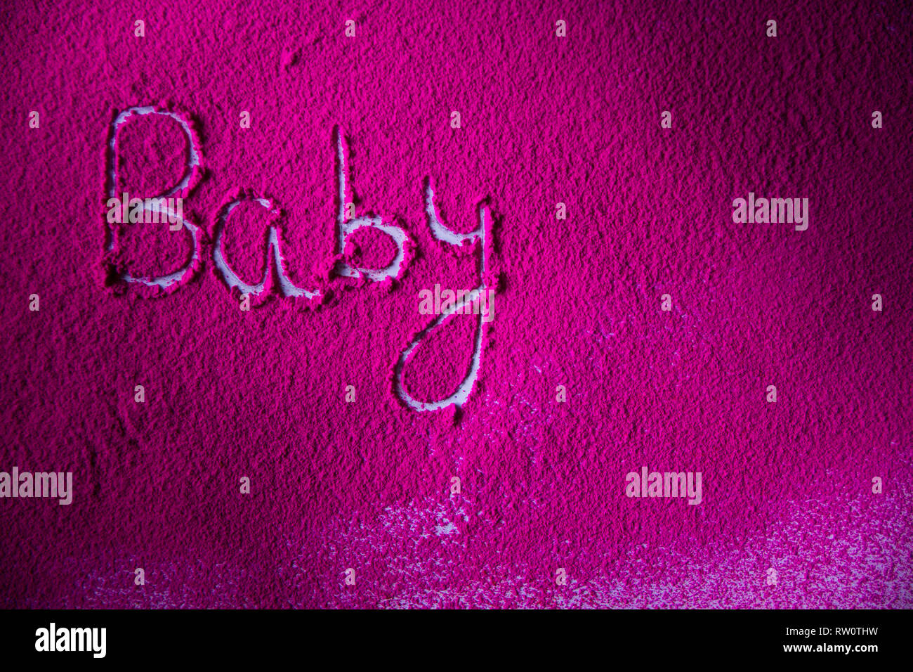 Colorful Powder written word Baby Stock Photo