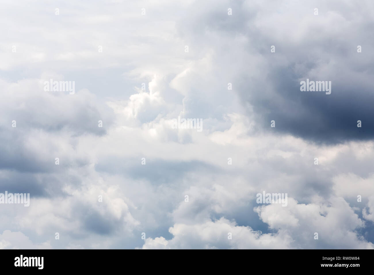Dramatic sunset sky with colorful clouds after thunderstorm, natural background or backdrop for sky replacement Stock Photo