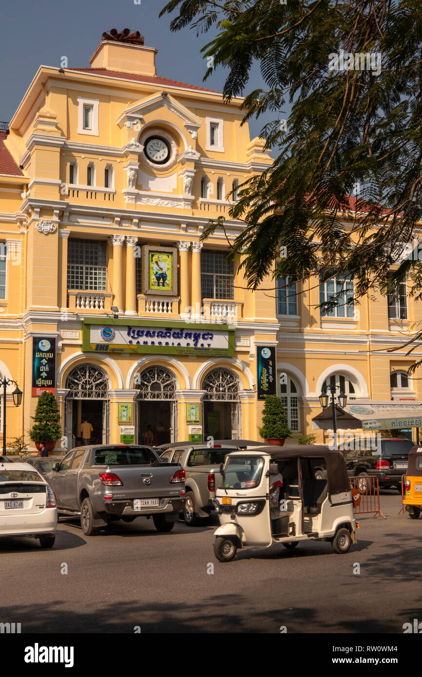 Cambodia, Phnom Penh, City Centre, Street 13, traffic passing old French colonial era Post Office building Stock Photo