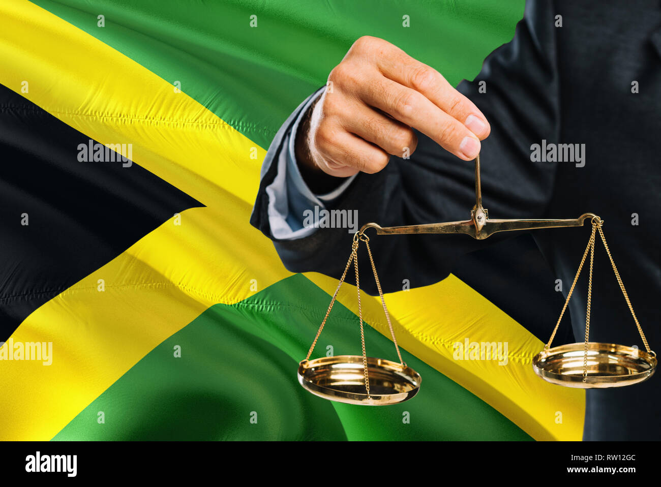 Jamaican Judge Is Holding Golden Scales Of Justice With Jamaica Waving