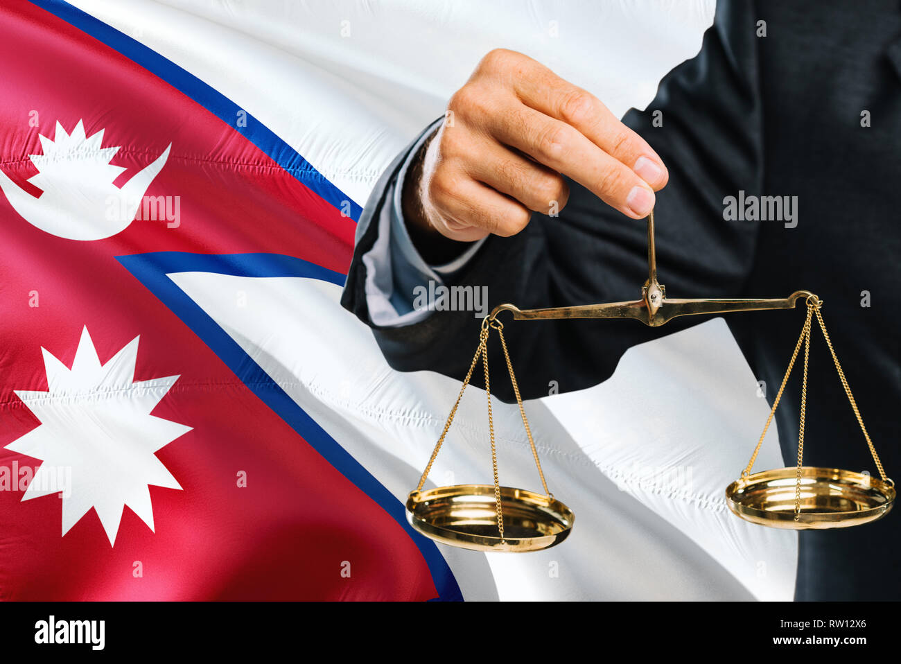 Nepalese Judge is holding golden scales of justice with Nepal waving