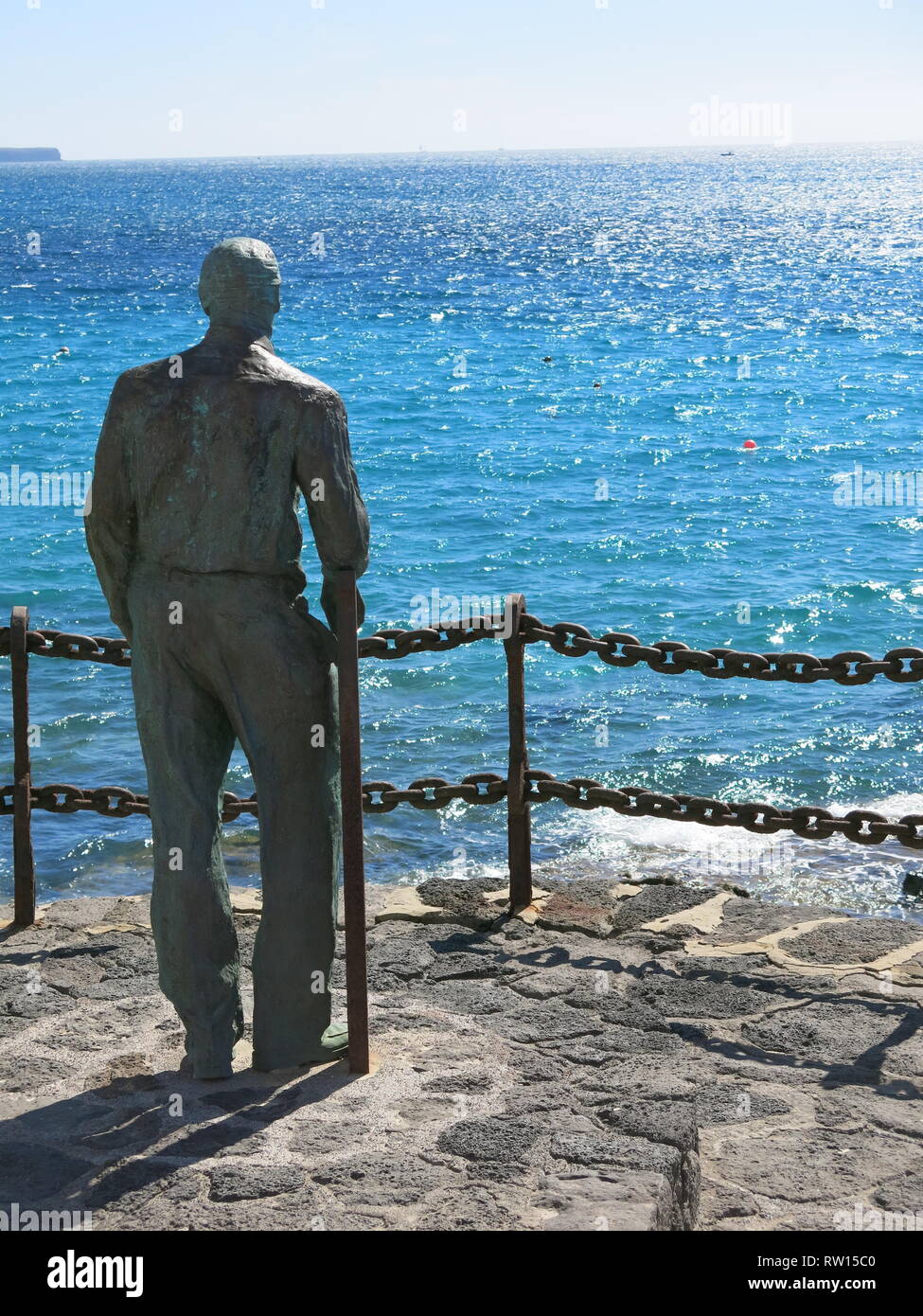 Statue man looking out sea hires stock photography and images Alamy