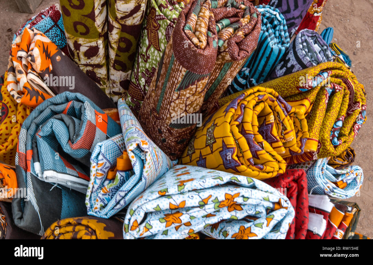 A beautiful selection of colorful traditional Ghanaian fabrics sold at Bolgatanga *Bolga( market in Ghana, West Africa Stock Photo