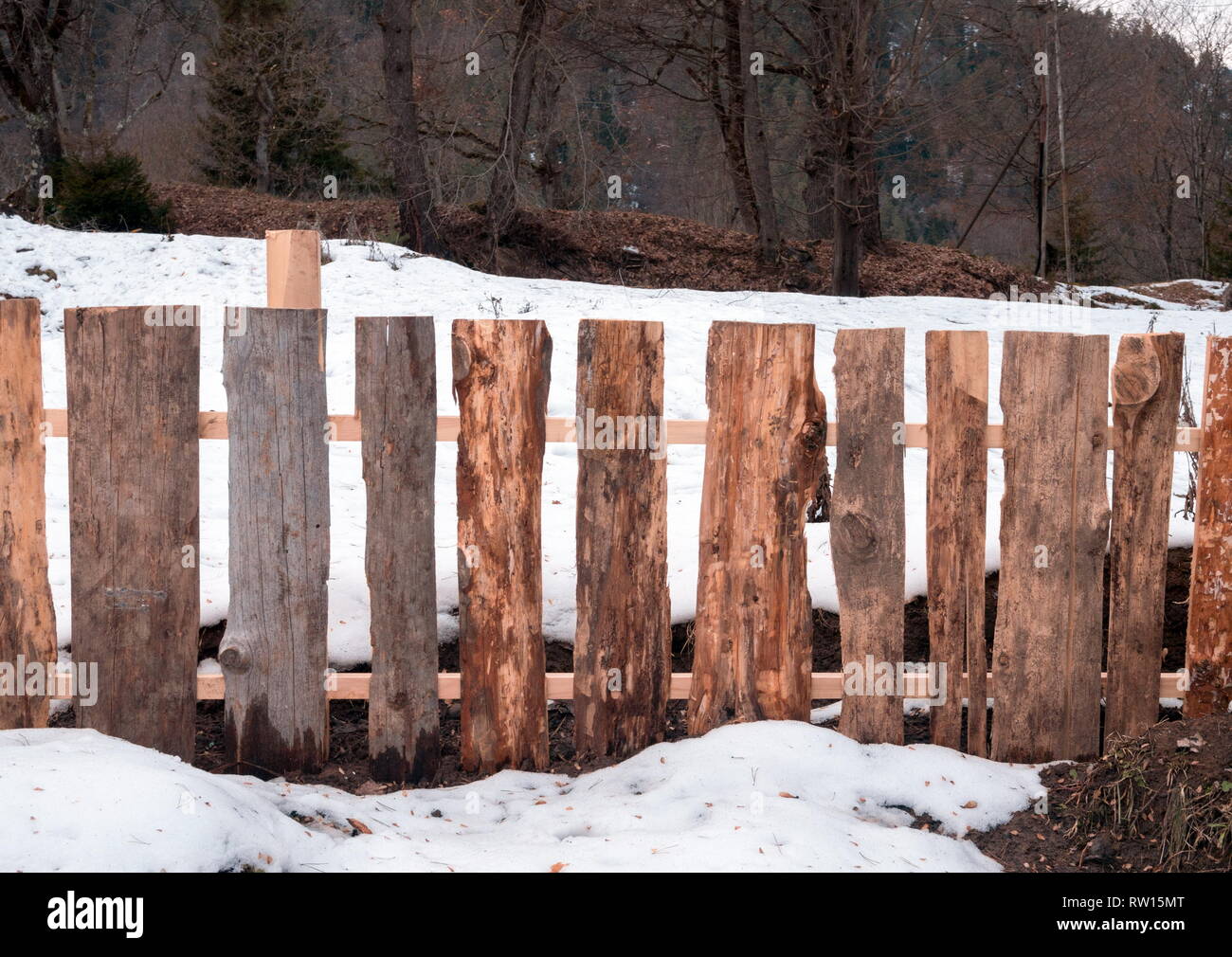 Wooden fence with the snow Stock Photo - Alamy