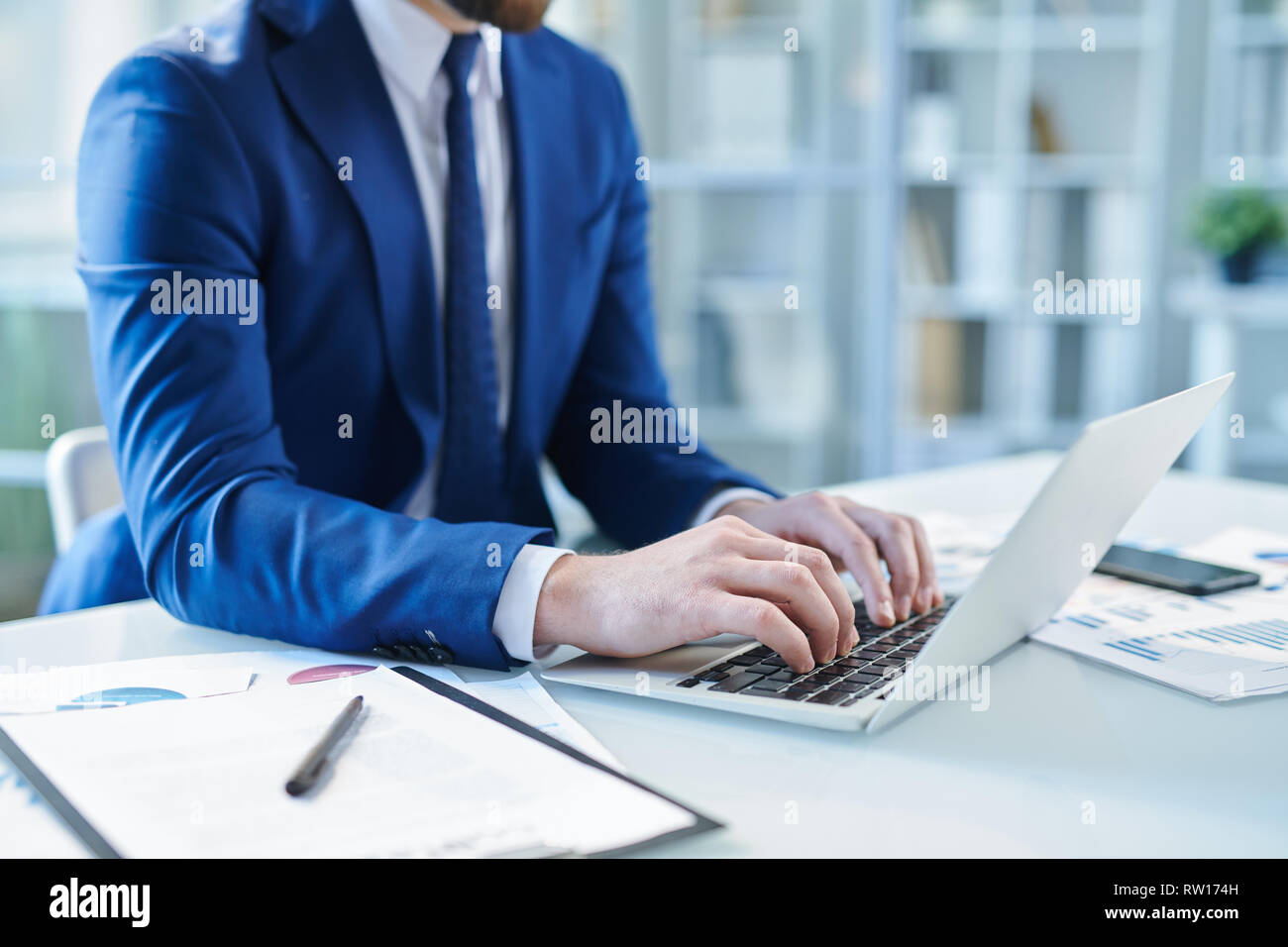 Person typing on keypad hi-res stock photography and images - Alamy