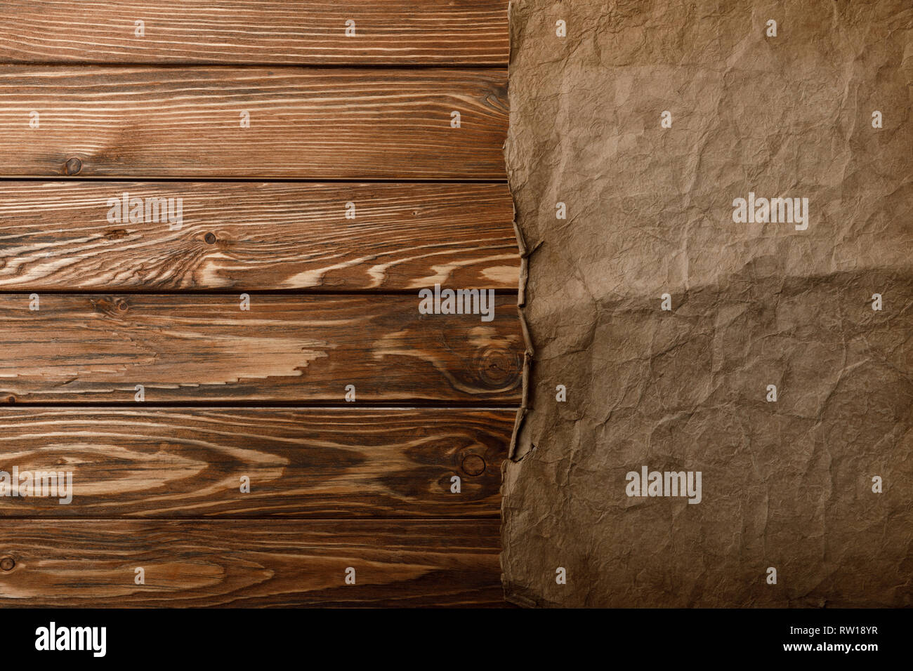 Top View Brown Parchment Paper Lying Wooden Background Stock Photo by  ©AntonMatyukha 246027480
