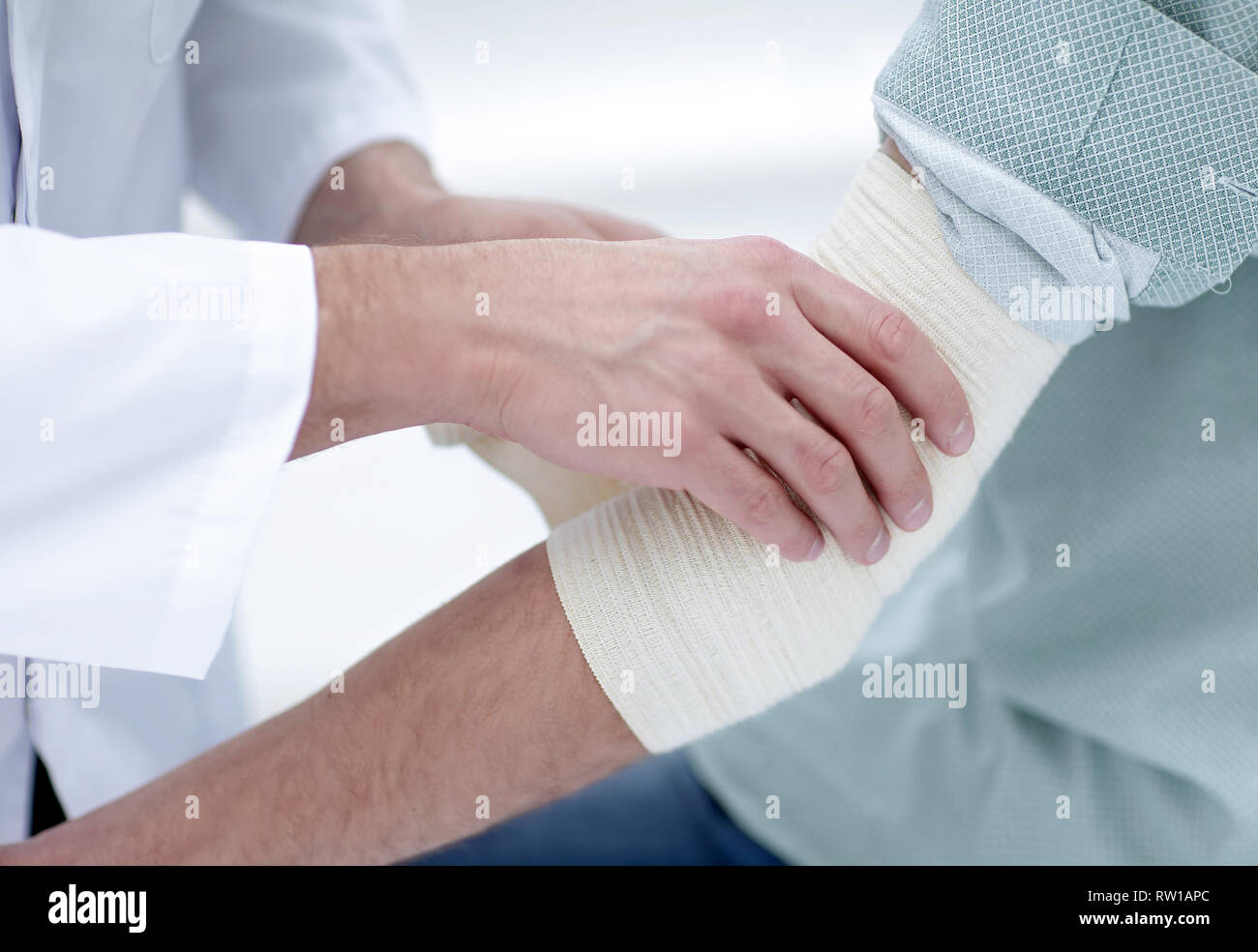 closeup.doctor applying elastic bandage Stock Photo Alamy