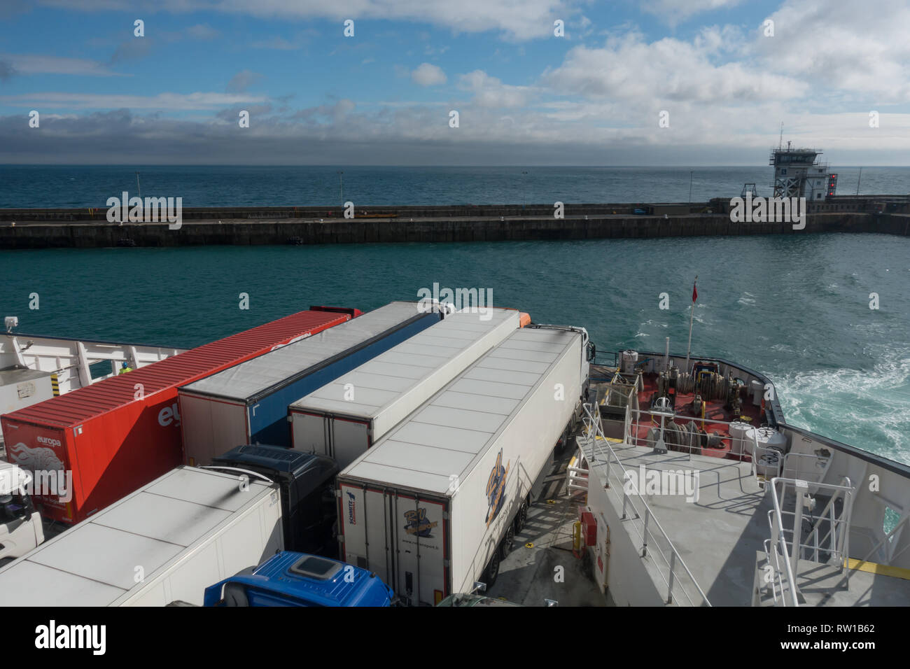 DFDS Ferry at entering Dover port with container lorries on the open