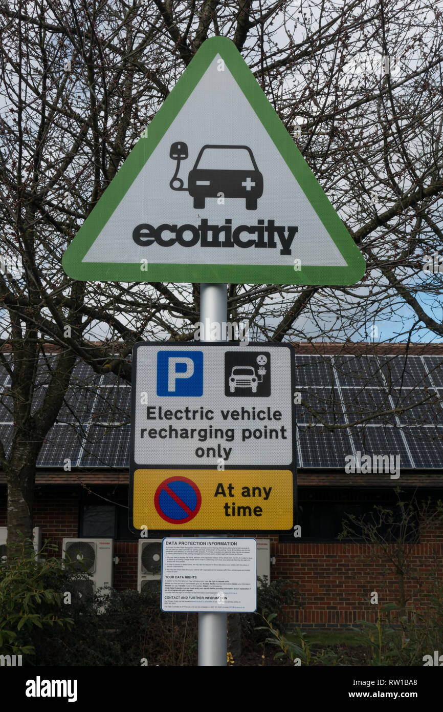 Electric car charging points at service area. British Isles Stock Photo