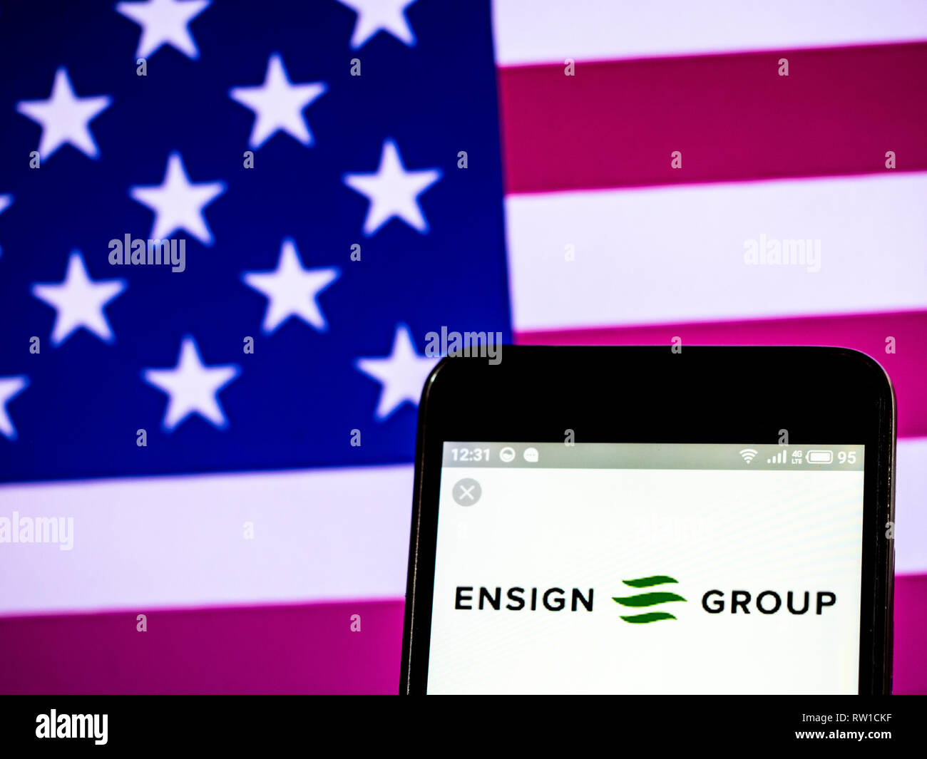 The Ensign Group, Inc. logo seen displayed on smart phone Stock Photo