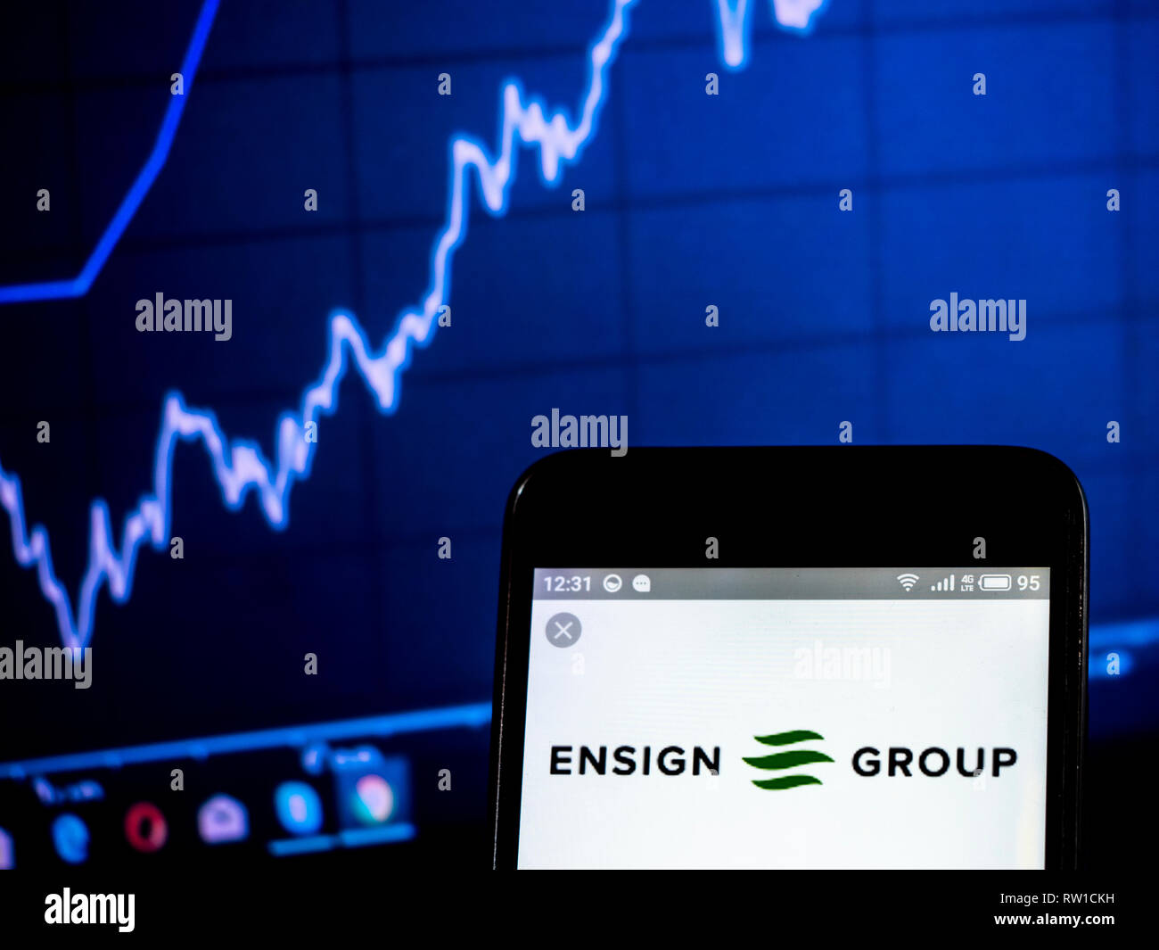 The Ensign Group, Inc. logo seen displayed on smart phone Stock Photo