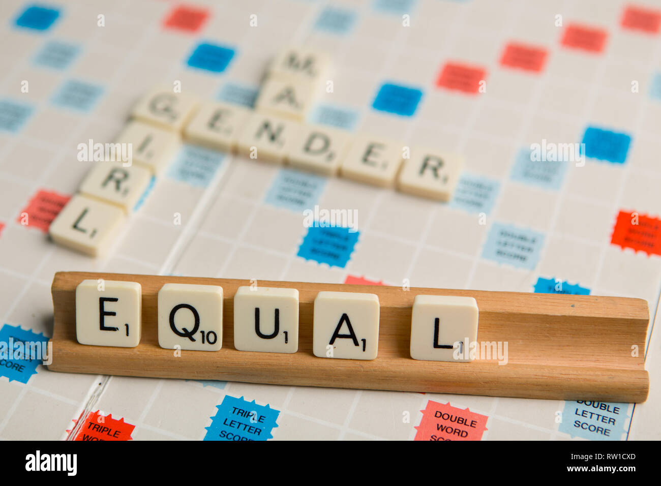 Tiles spell out the word 'equal' Stock Photo