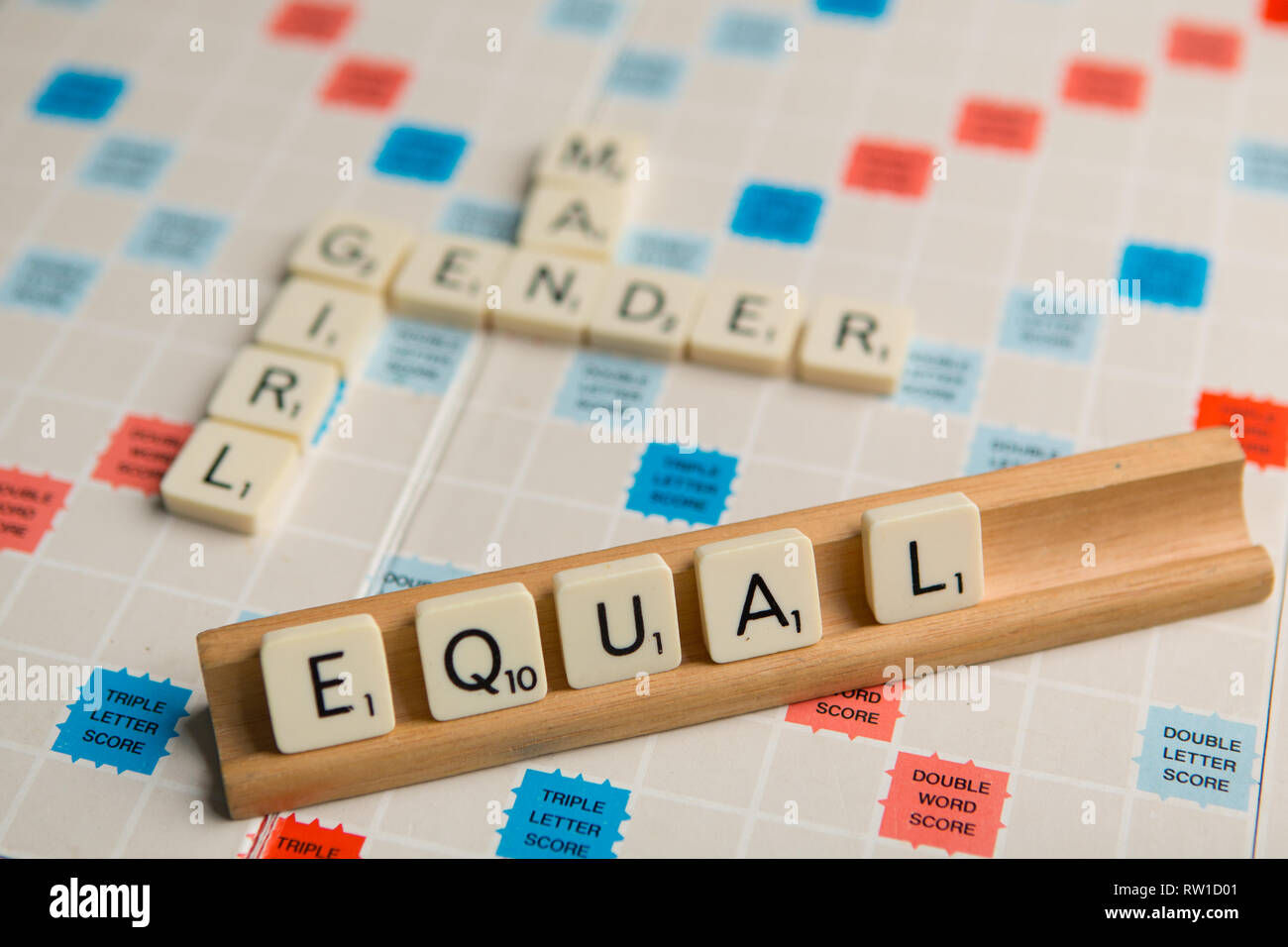 Tiles spell out the word 'equal' Stock Photo