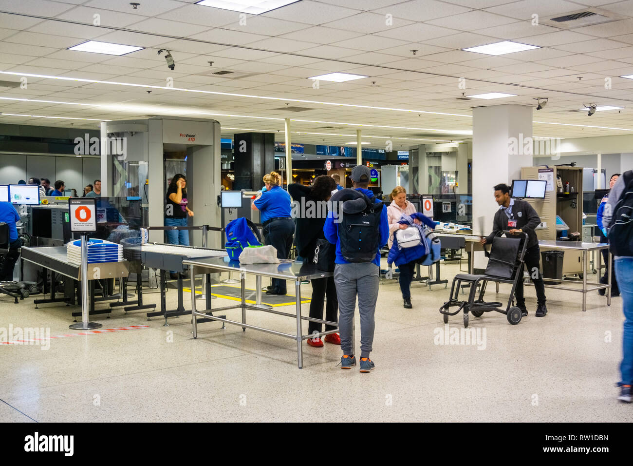 Airport security control point x ray hires stock photography and