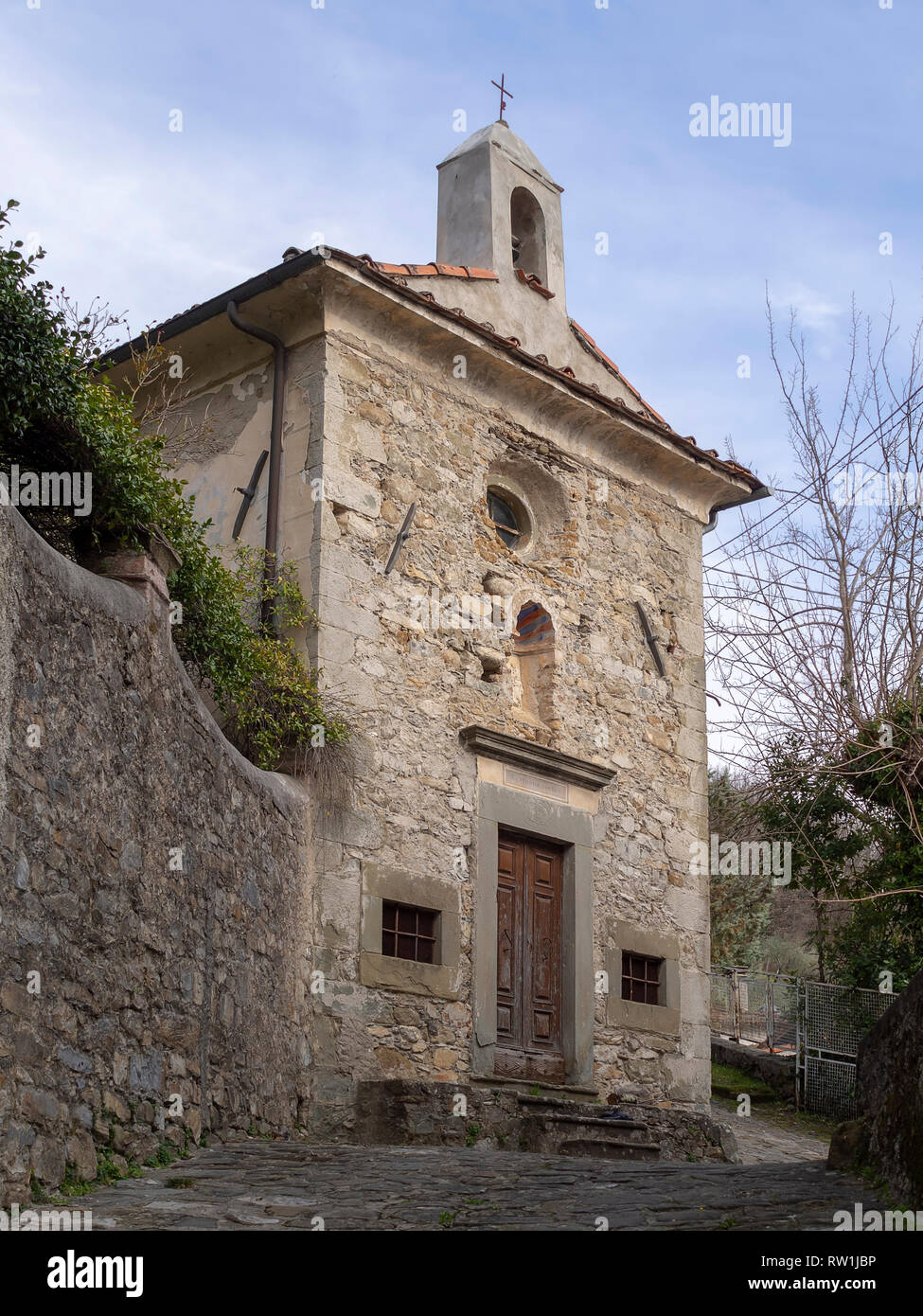 Small religious building, church or pieve, Pognana village near Verrucola in Lunigiana area of north Tuscany, Italy. Stock Photo