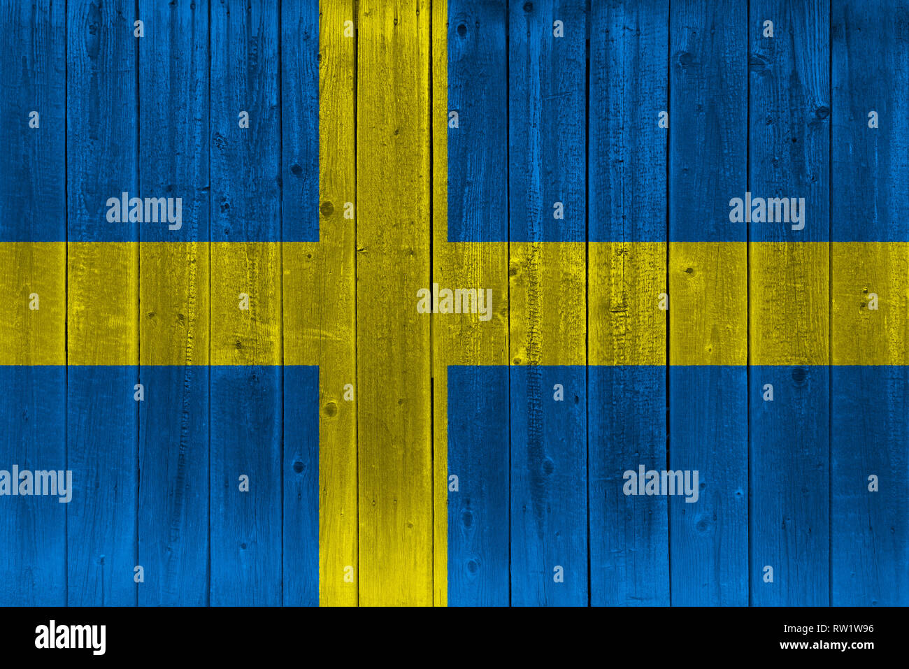 Sweden flag painted on old wood plank. Patriotic background. National flag of Sweden Stock Photo