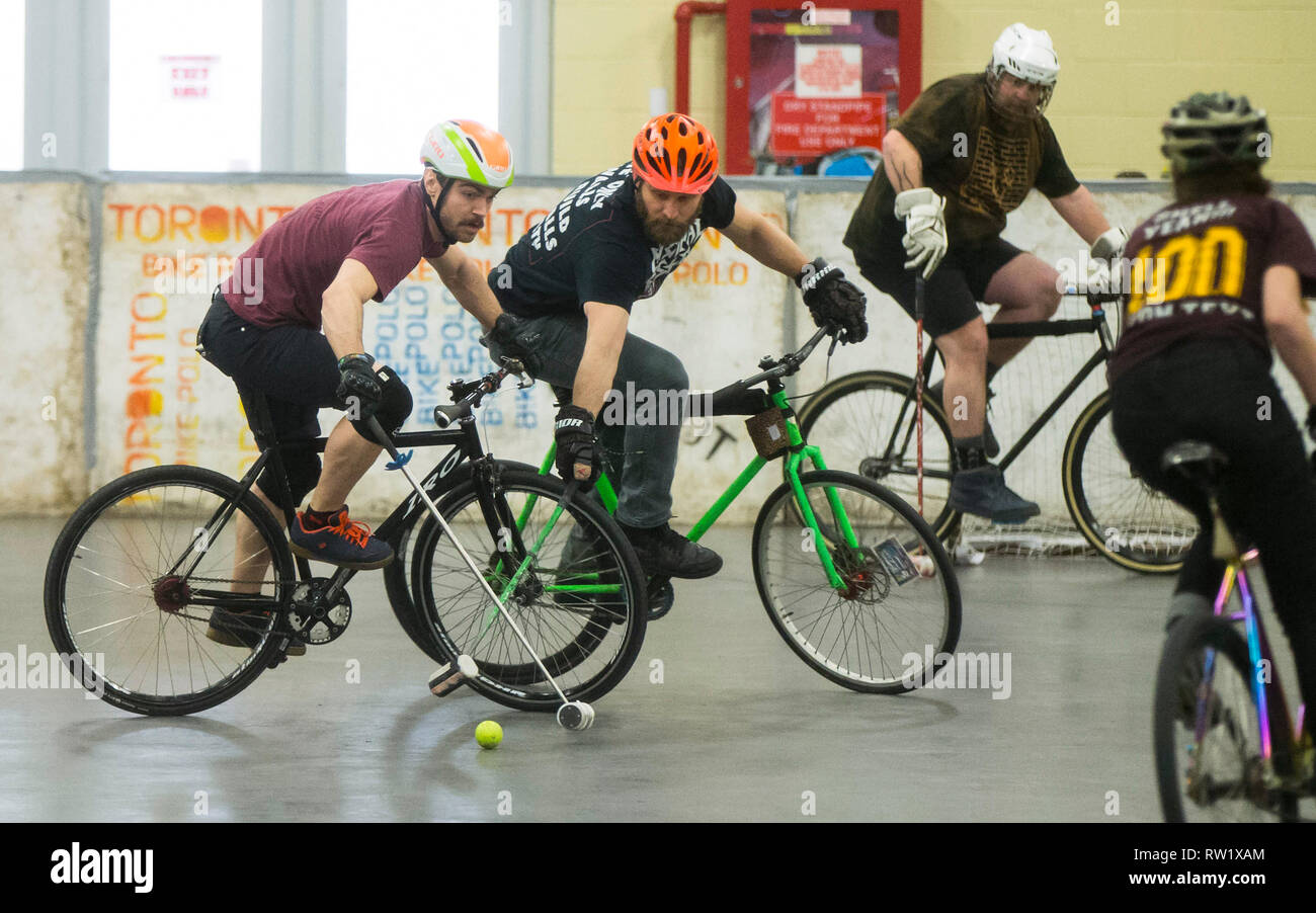 Toronto, Canada. 3rd Mar, 2019. Participants compete during the Great Lakes Winter Classic Bike Polo Tournament in Toronto, Canada, March 3, 2019. Bike Polo is a team sport combining the bicycle rider's skills with the fast-paced action of hockey. Credit: Zou Zheng/Xinhua/Alamy Live News Stock Photo