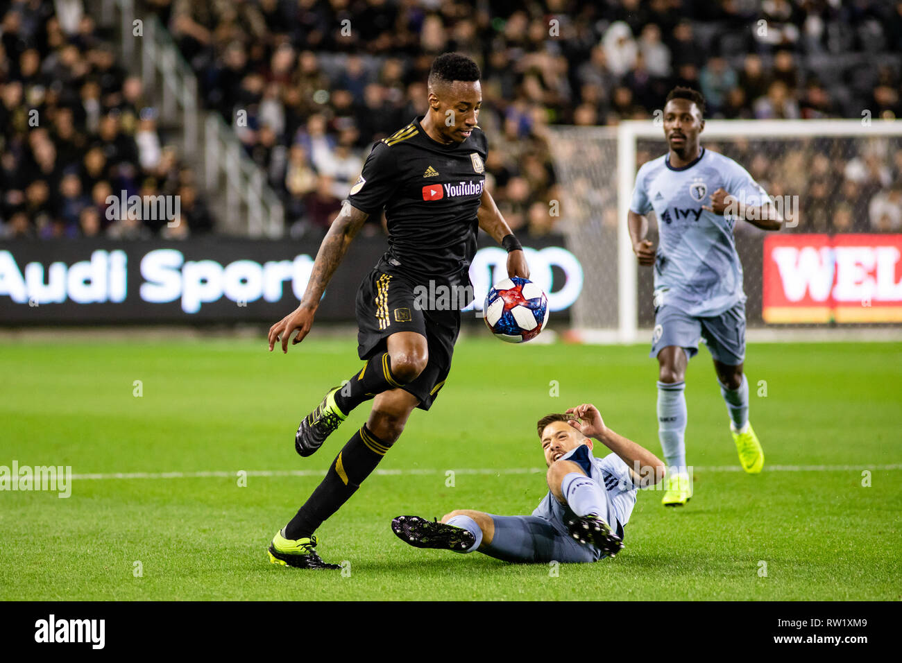 Los Angeles, USA. 3rd March, 2019. Mark-Anthony Kaye (14) evades a tackle during LAFC's 2-1 win over Sporting KC.  Credit: Ben Nichols/Alamy Live News Stock Photo