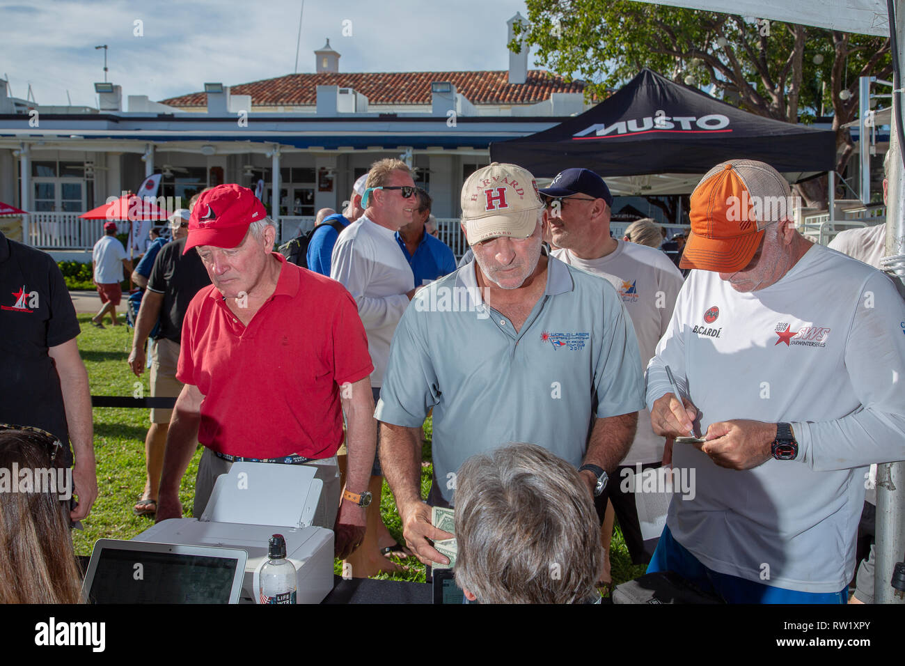 International Star Class Yacht Racing Association sailors participating in the 2019 Bacardi Cup Regatta signing up to register for the event Stock Photo