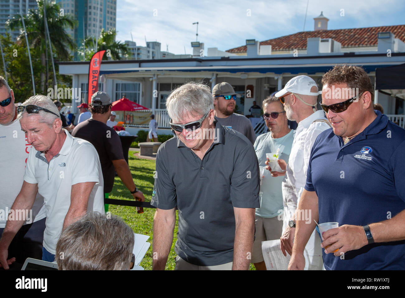 International Star Class Yacht Racing Association sailors participating in the 2019 Bacardi Cup Regatta signing up to register for the event Stock Photo