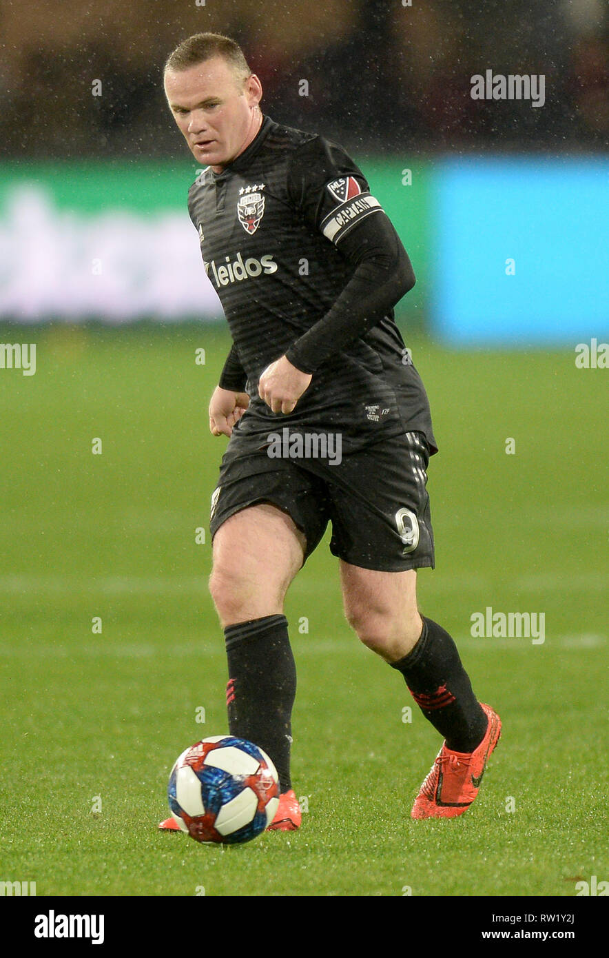 Washington, DC, USA. 3rd Mar, 2019. 20190303 - D.C. United forward WAYNE ROONEY (9) passes against Atlanta United FC during a steady rain in the first half at Audi Field in Washington. Credit: Chuck Myers/ZUMA Wire/Alamy Live News Stock Photo