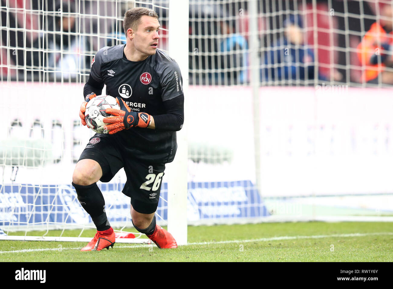 02 March 2019, Bavaria, Nürnberg: Soccer: Bundesliga, 1st FC Nuremberg - RB Leipzig, 24th matchday in Max Morlock Stadium. Nuremberg goalkeeper Christian Mathenia in action. Photo: Daniel Karmann/dpa - IMPORTANT NOTE: In accordance with the requirements of the DFL Deutsche Fußball Liga or the DFB Deutscher Fußball-Bund, it is prohibited to use or have used photographs taken in the stadium and/or the match in the form of sequence images and/or video-like photo sequences. Stock Photo