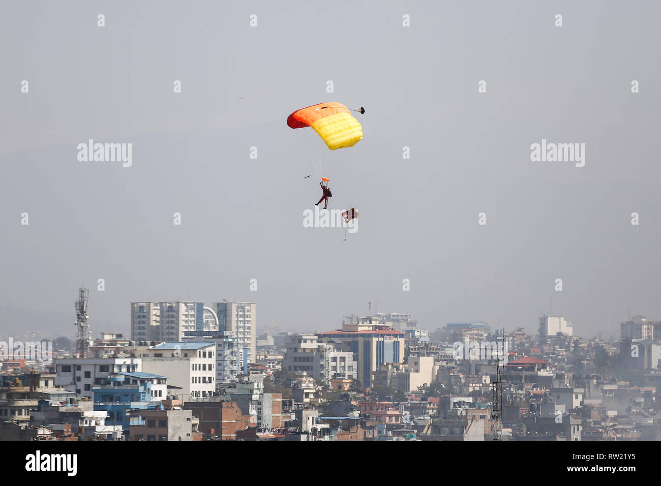A Nepalese Army soldier demonstrate parachute skills during the Nepal