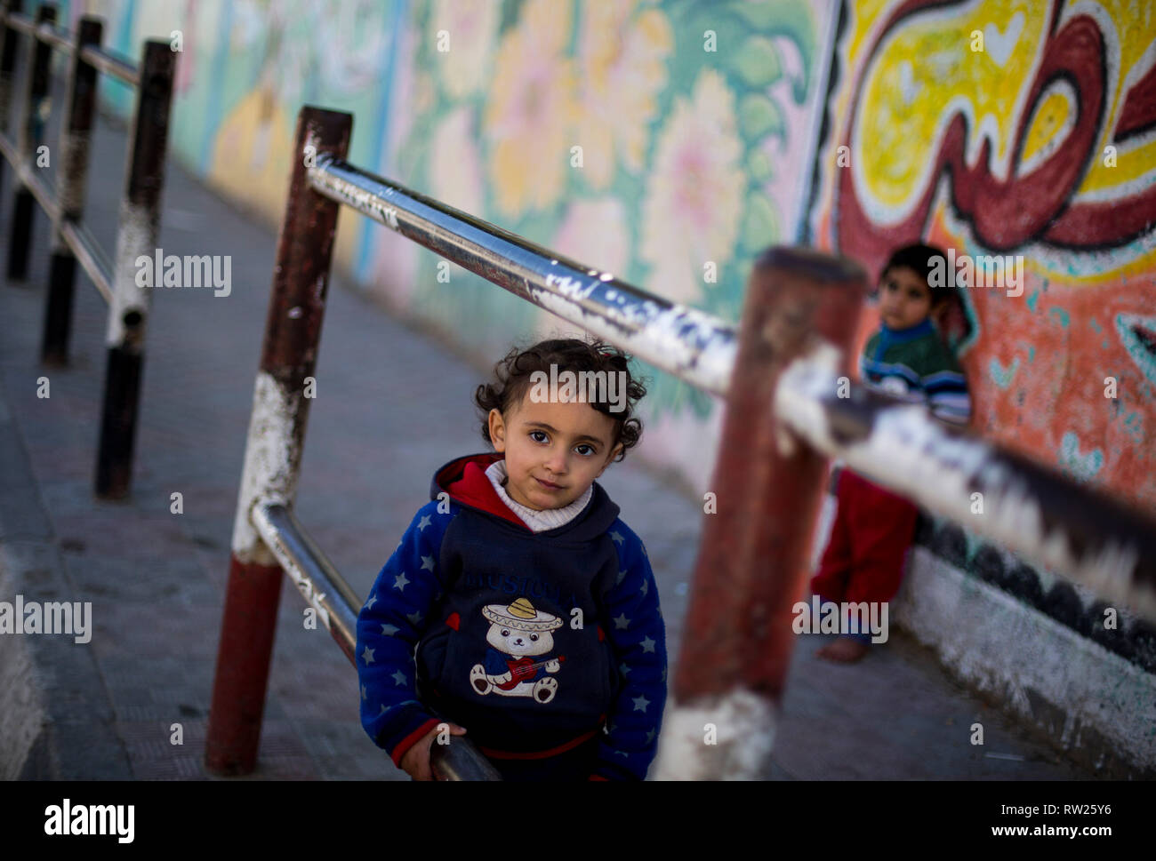 Gaza, Palestine. 4th Mar 2019. A Palestinian girl seen standing near their house at the Jabalya refugee camp in the northern Gaza Strip. With high rates of unemployment and lack of job opportunities in Gaza, an increasing number of families are facing poverty after losing work during the last 12-year blockade on Gaza. Credit: SOPA Images Limited/Alamy Live News Stock Photo