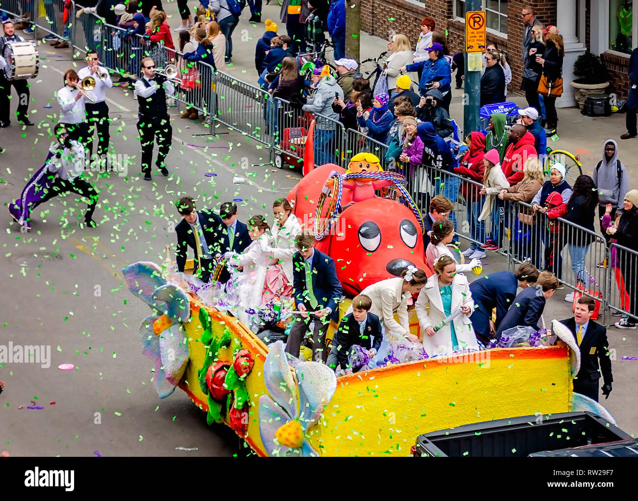 Mobile, Alabama, USA. 4th March, 2019. A Mardi Gras float featuring Clifford the Big Red Dog travels down Royal Street during the Floral Parade, March 4, 2019, in Mobile, Alabama. The theme of this year’s floral parade was “Throw Me a Book,” with 16 floats featuring classic characters from children’s books. Mobile’s first official Mardi Gras celebration was recorded in 1703. Mardi Gras originated as a French tradition of feasting and revelry before the austere Catholic Lent. Credit: Carmen K. Sisson/Cloudybright/Alamy Live News Stock Photo