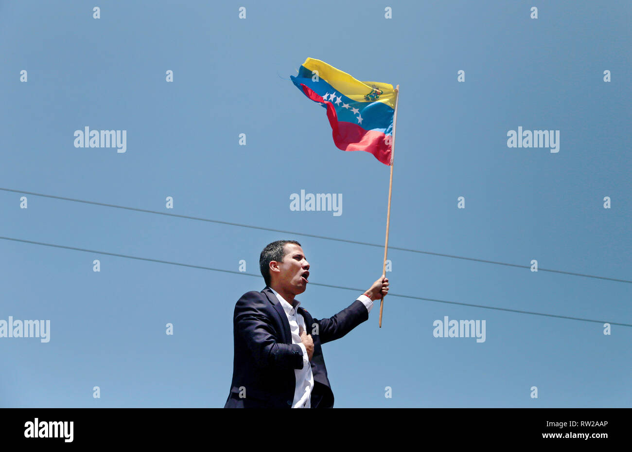 Caracas, Venezuela. 04th Mar, 2019. 04 March 2019, Venezuela, Maiquetía: Juan Guaido, self-proclaimed interim president of Venezuela, sings the national anthem after his arrival at Simon Bolivar International Airport. Guaido has returned to Venezuela after about one and a half weeks. Photo: Rafael Hernandez/dpa Credit: dpa picture alliance/Alamy Live News Stock Photo