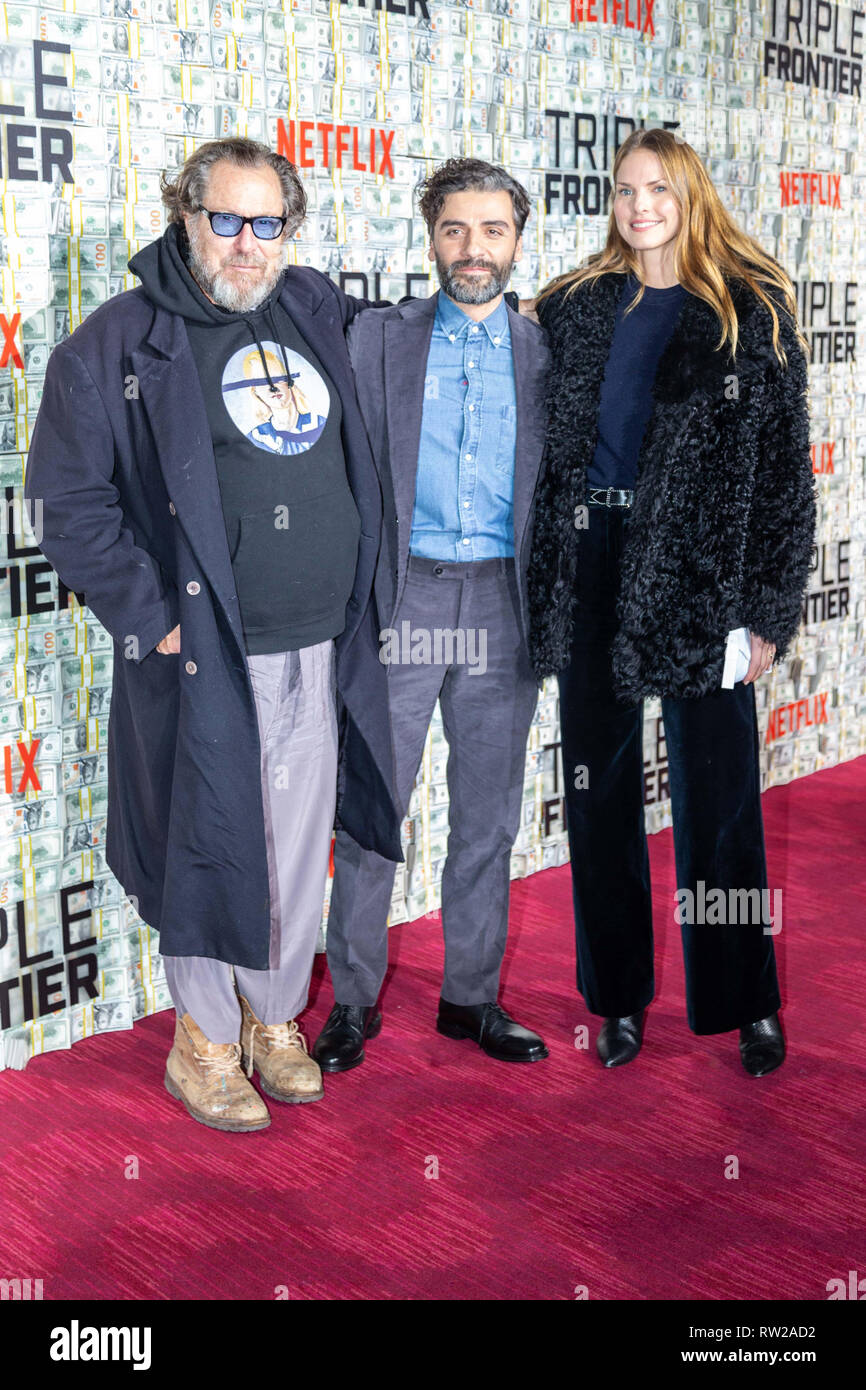 New York, New York, USA. 3rd March, 2019. Julian Schnabel, Oscar Isaac, and Louise Kugelberg attend the world premiere of Netflix’s “Triple Frontier” at Jazz at Lincoln Center in New York City on March 3, 2019. Credit: Jeremy Burke/Alamy Live News Stock Photo