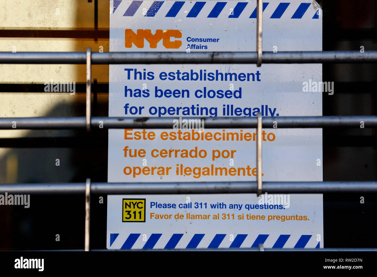 NYC Department of Consumer Affairs notice 'This establishment has been closed for operating illegally' Stock Photo