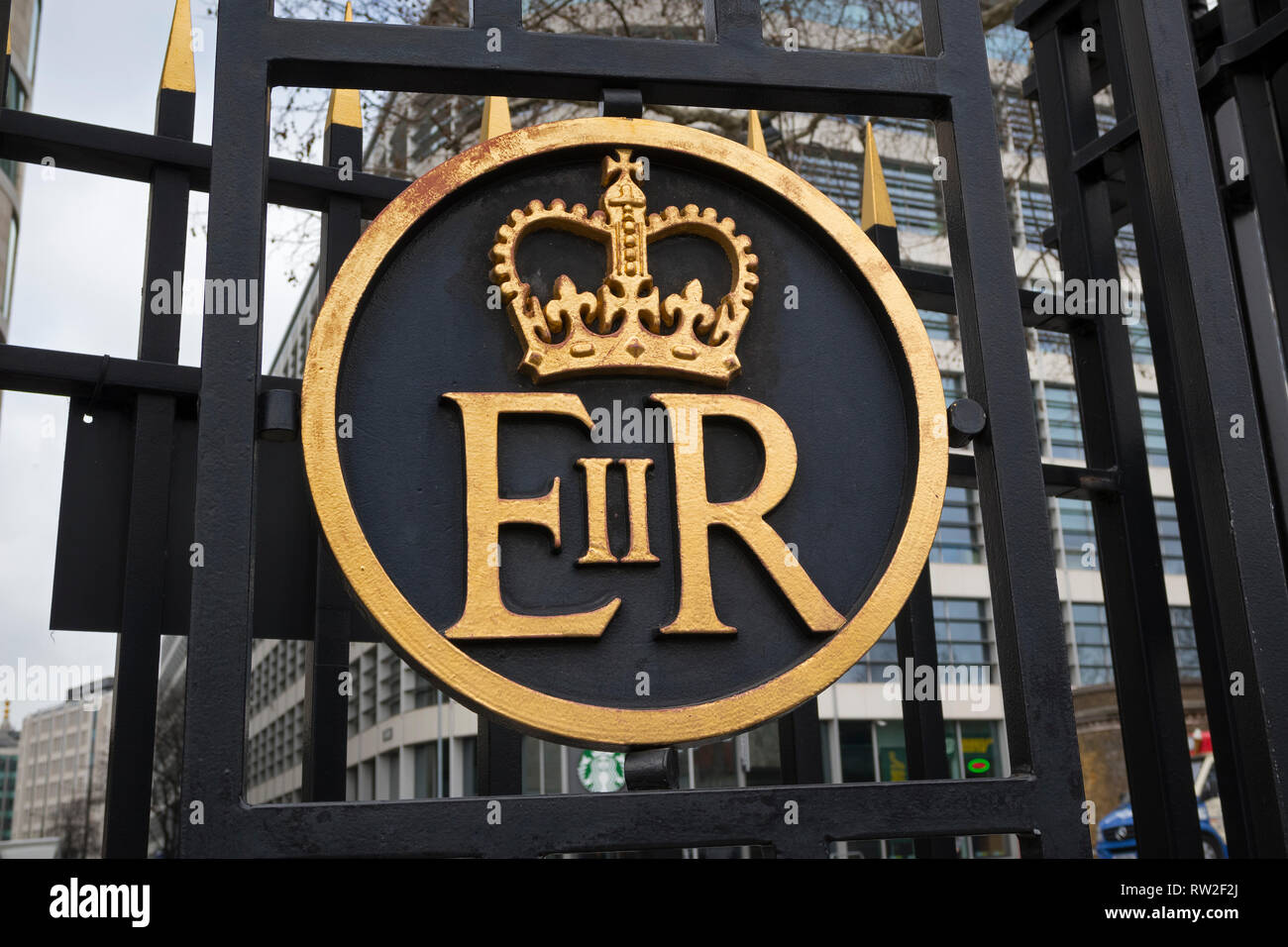 London, England - February 28, 2019:  Elizabeth II Regina ER royal insignia on the gate of the Tower of London, England. Stock Photo
