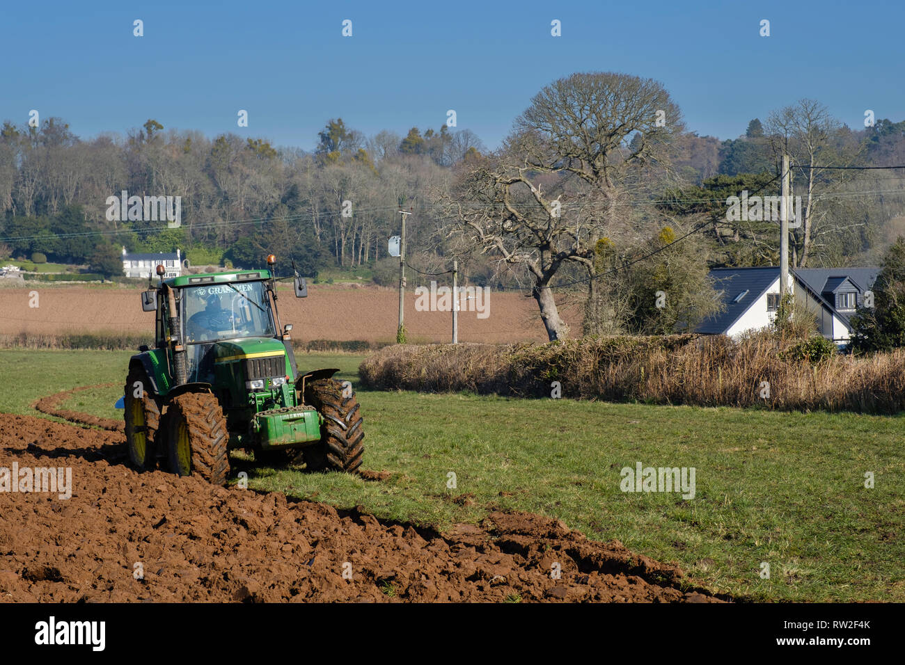 TRACTOR SPRING PLOUGHING. Stock Photo