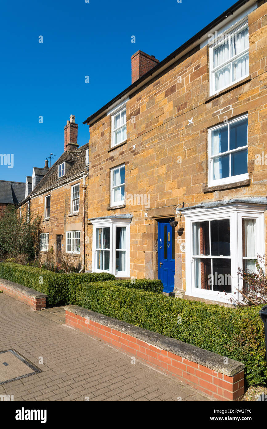 Old stone cottages or houses in High Street West in Uppingham, market